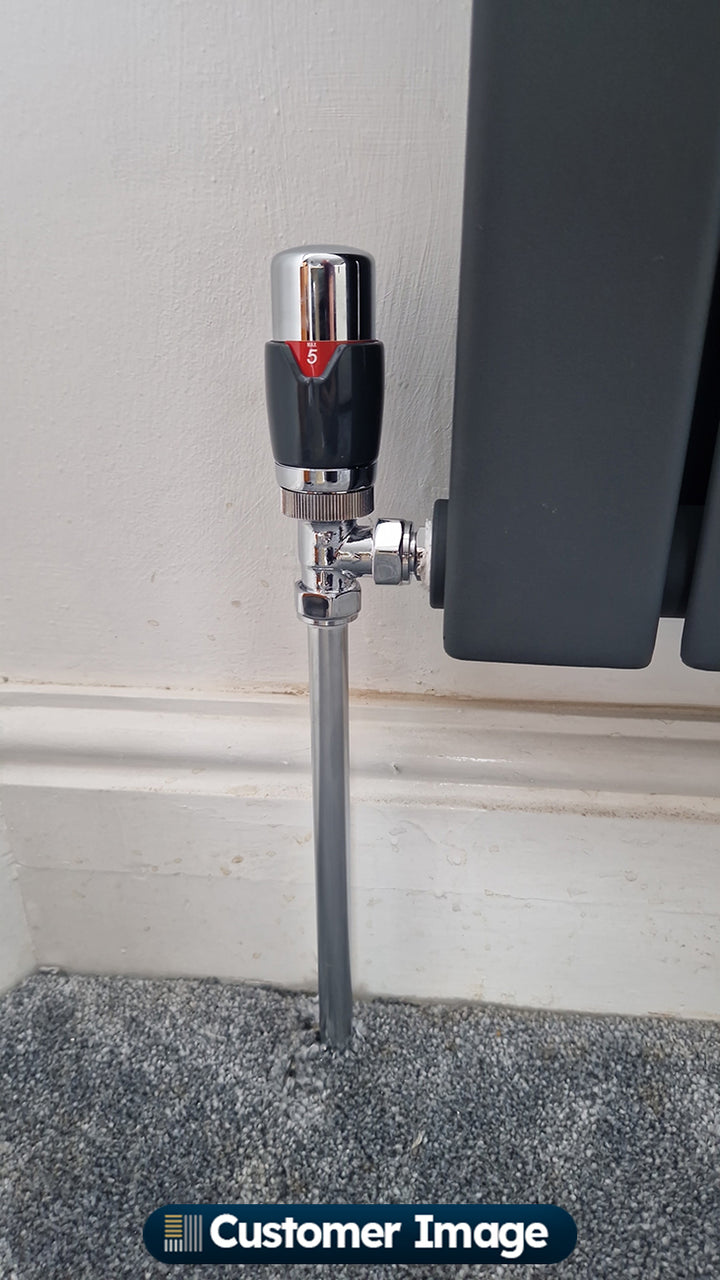 UK Radiators Talus Flair Thermostatic Radiator Valve Anthracite Angled installed in hallway