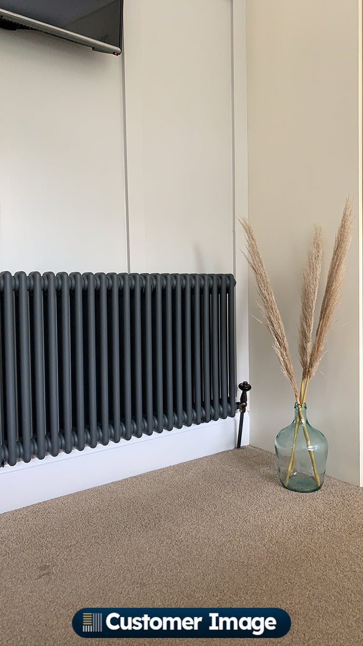 UK Radiators Signature Wooden Head Thermostatic Radiator Valve Black Nickel Angled installed in room