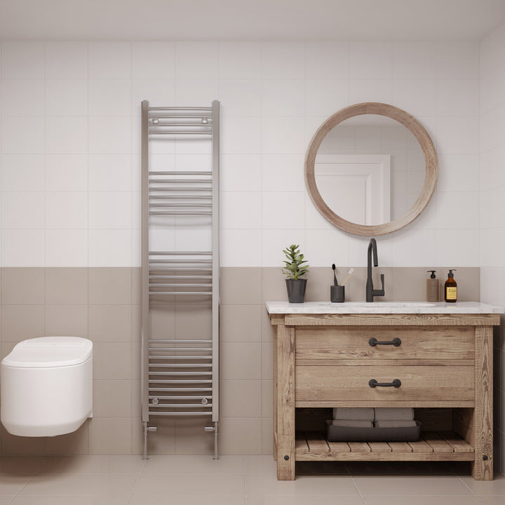 Zennor chrome heated towel rail, 1600mm x 400mm curved bathroom radiator, fitted in a modern bathroom