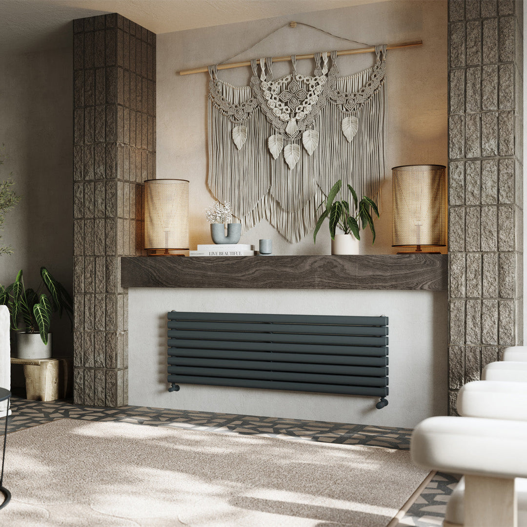 An anthracite radiator sits in a nook beneath a wood panel with storage behind.