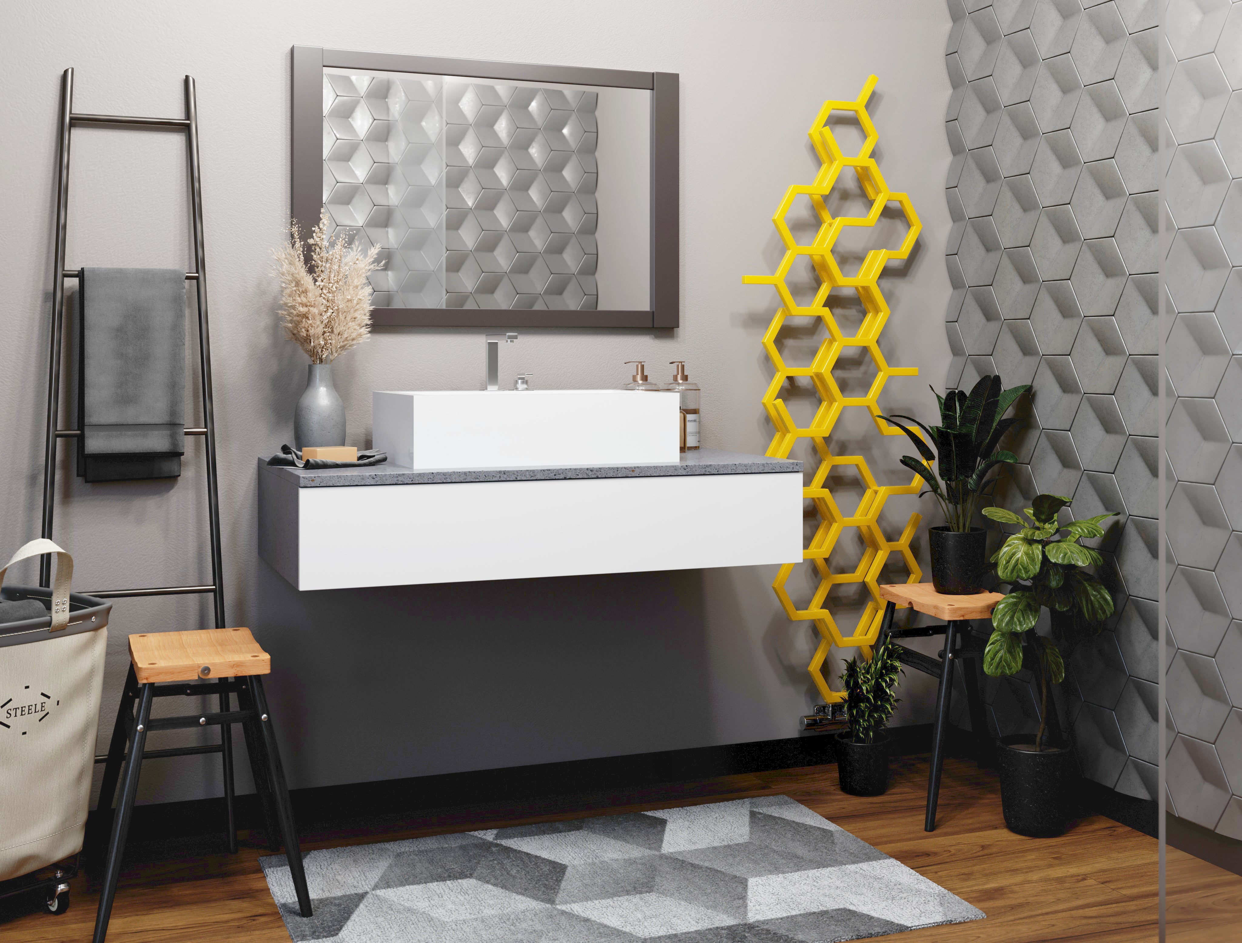 A modern bathroom featuring the mustard-yellow ‘Hex’ radiator from UK Radiators, which is made up of hexagons to resemble a beehive.