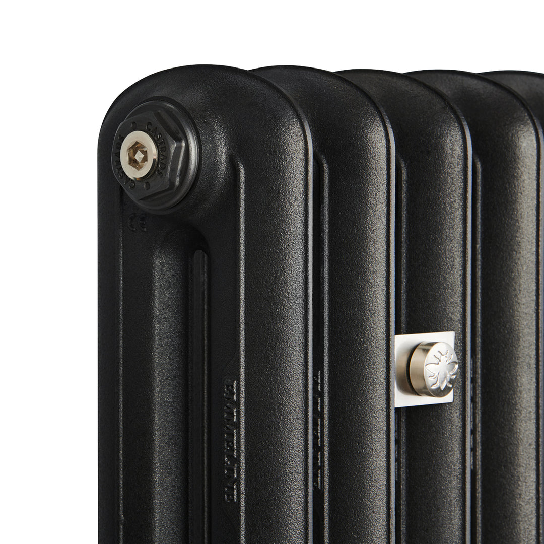 Emmeline Astral Grey Dark 2 column cast iron column radiator, angled side view showing the column depth and sectional detailing