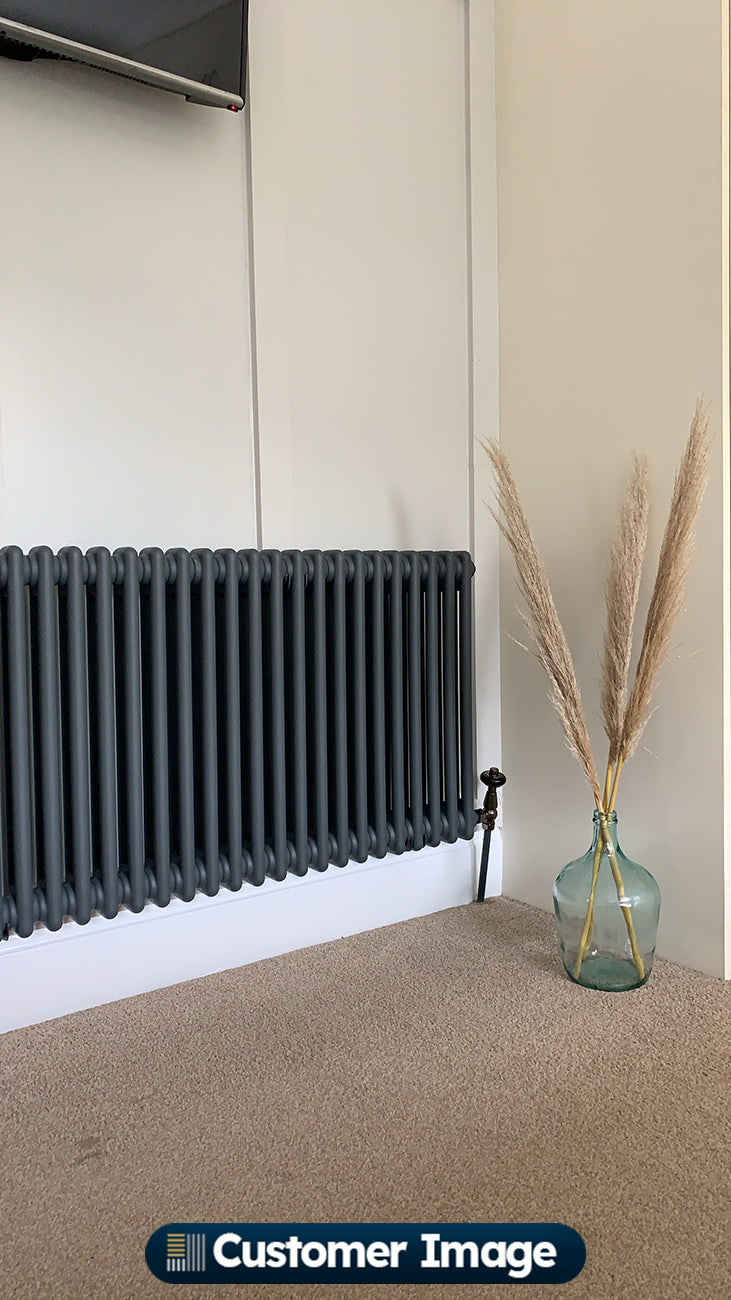 UK Radiators Signature Wooden Head Thermostatic Radiator Valve Black Nickel Angled installed in room
