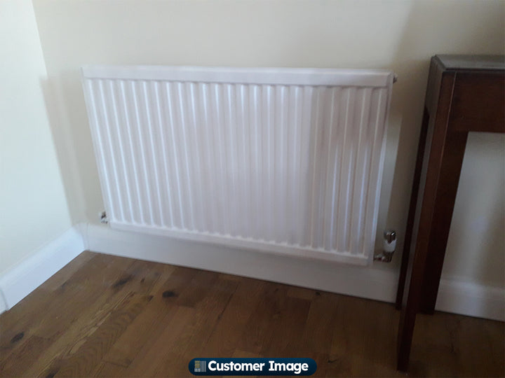 UK Radiators Talus Flair - Thermostatic Radiator Valve White Corner installed in room