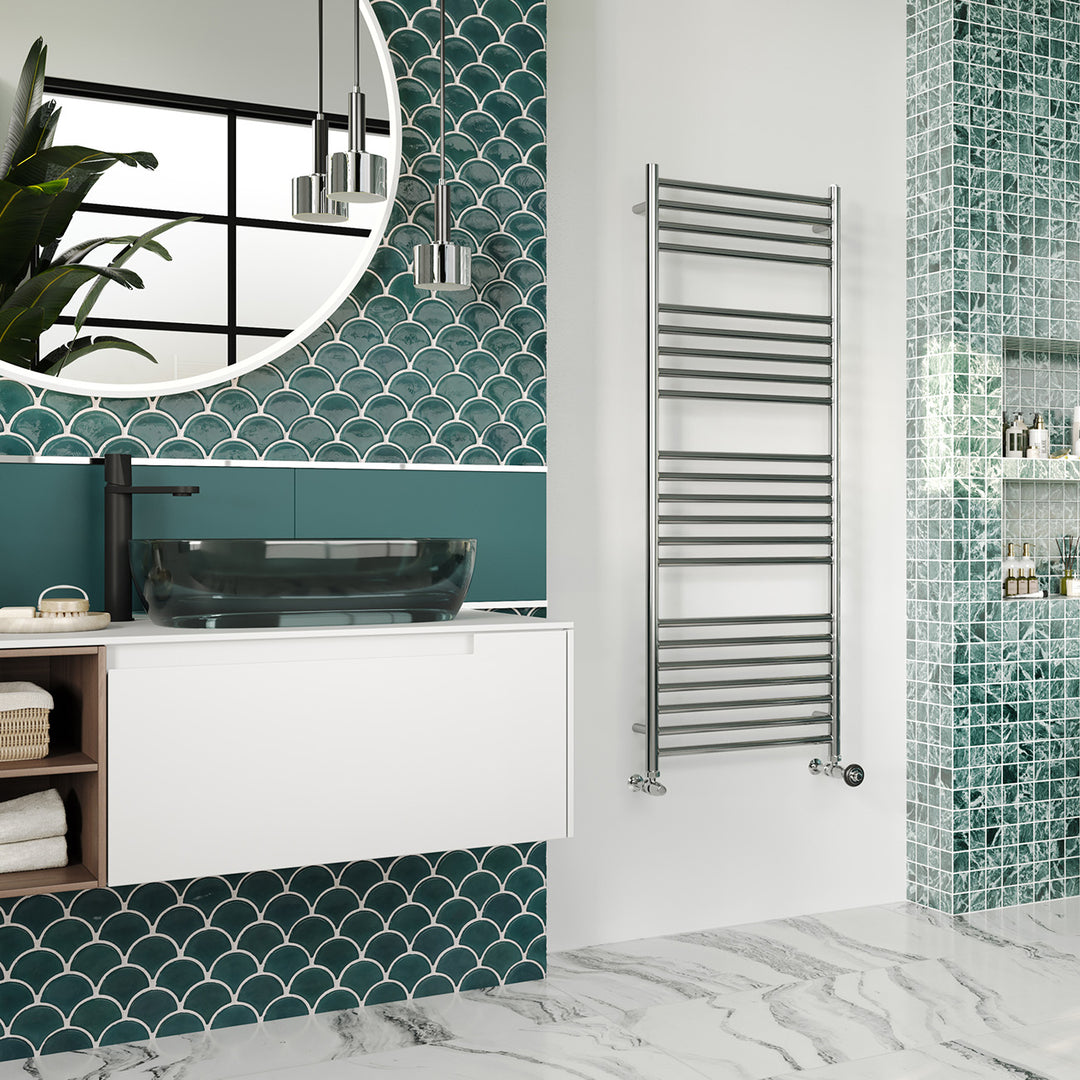 Aston stainless steel heated towel rail, 1400mm x 500mm curved bathroom radiator, fitted on a white wall in a modern bathroom