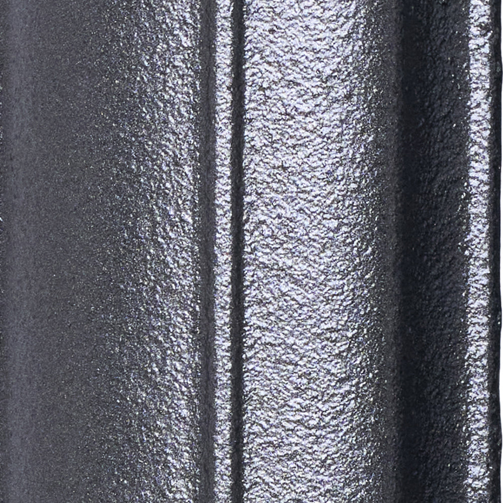 Close-up of the Astral Grey Mid cast iron radiator finish on a curved column surface.